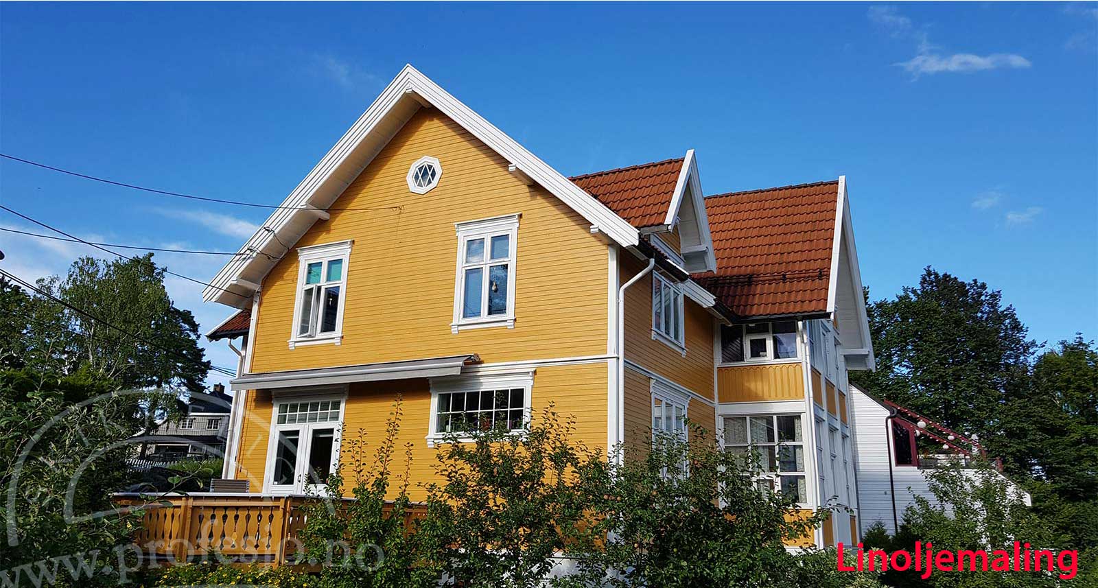 linoljemaling hus etter maling - hus i fargene gul - utvendig maling